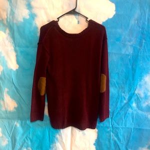 Knitted sweater with leather elbow patches